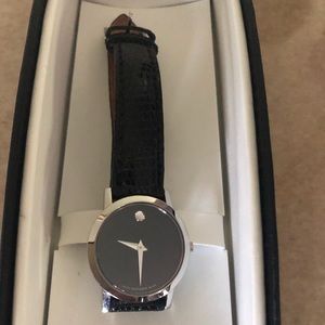 Movado women’s museum watch.Works GREA- Comes in original box.